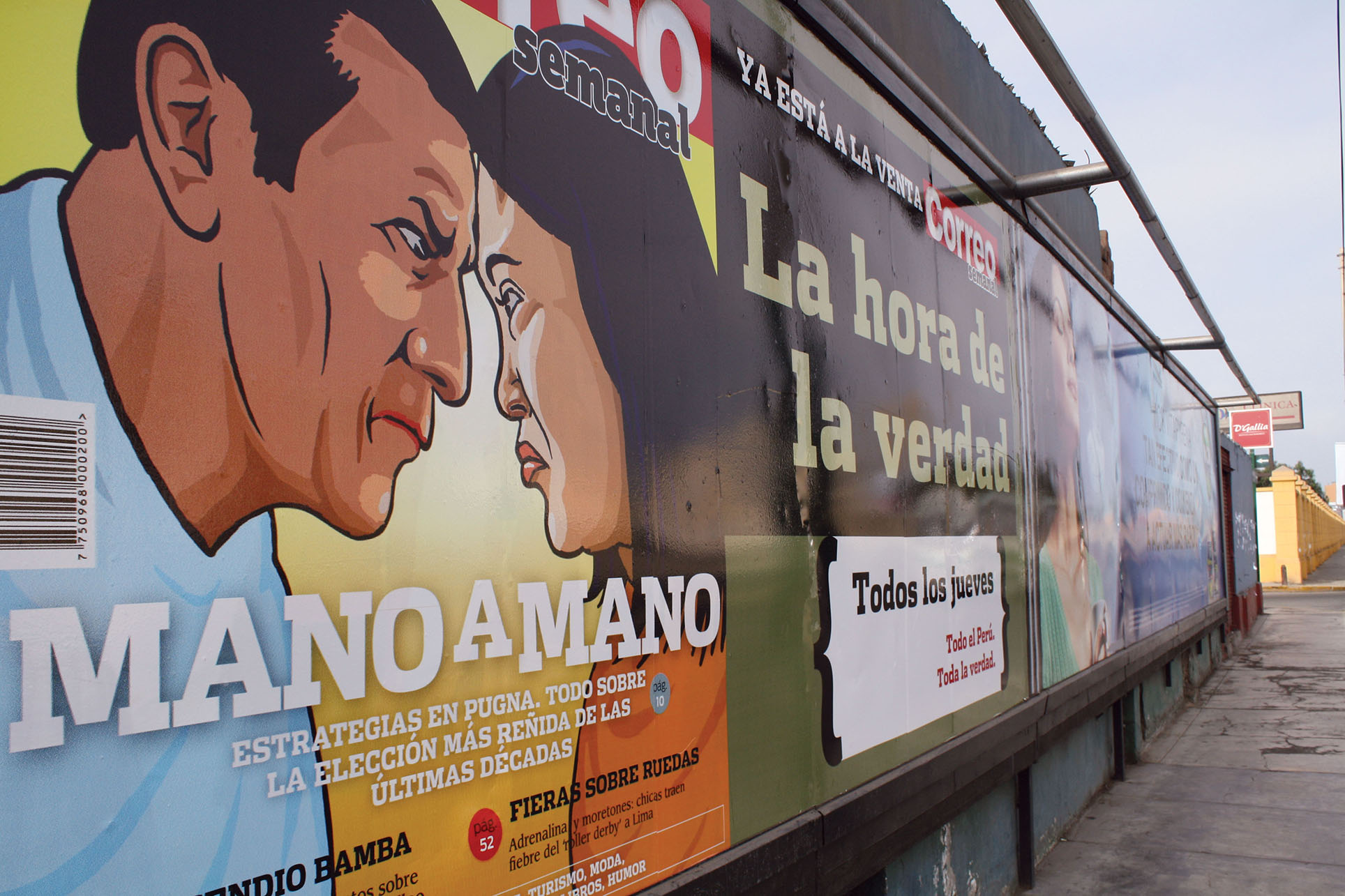 APeruvian billboard featuring a magazine cover announcing the upcoming presidential election face-off between Ollanta Humala and Keiko Fujimori. (Photo by Catherine Binet, The Advocacy Peace Project Fellow, 2011.)