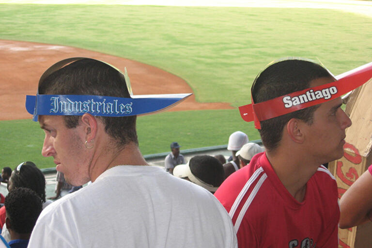 Two men at a baseball match 