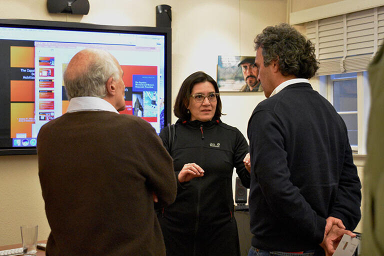 María Inclán discussing facing the photo 