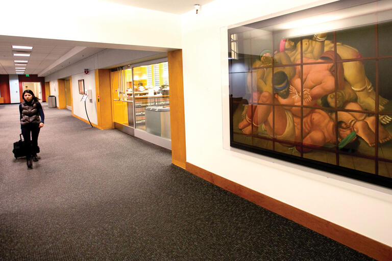 Botero’s “Abu Ghraib 57” hangs outside the library of the Berkeley Law School. (Photo by Jim Block.) A student walks by Botero’s “Abu Ghraib 57” hanging outside the library of the Berkeley Law School. (Photo by Jim Block.)