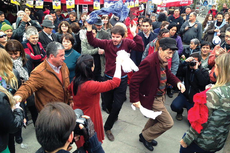 Giorgio Jackson, who went from leading a student protest movement to the Chilean congress, dances the cueca in the streets of Santiago. (Photo by guachacas.)