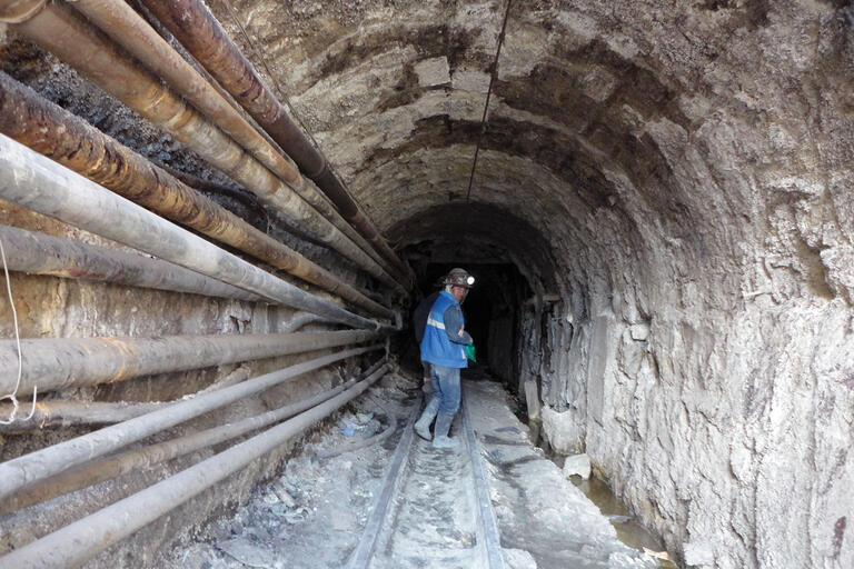 A miner heads below ground at the beginning of a day’s work. (Photo by Andrea Marston) A miner heads below ground into the tunnels of the mine at the beginning of a day’s work. (Photo by Andrea Marston.)