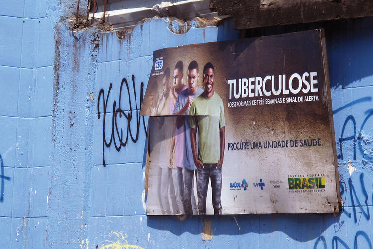 A billboard in the Rocinha favela of Rio de Janeiro warns that coughing for more than three weeks could be a symptom of tuberculosis. (Photo by Adam Greenfield.)