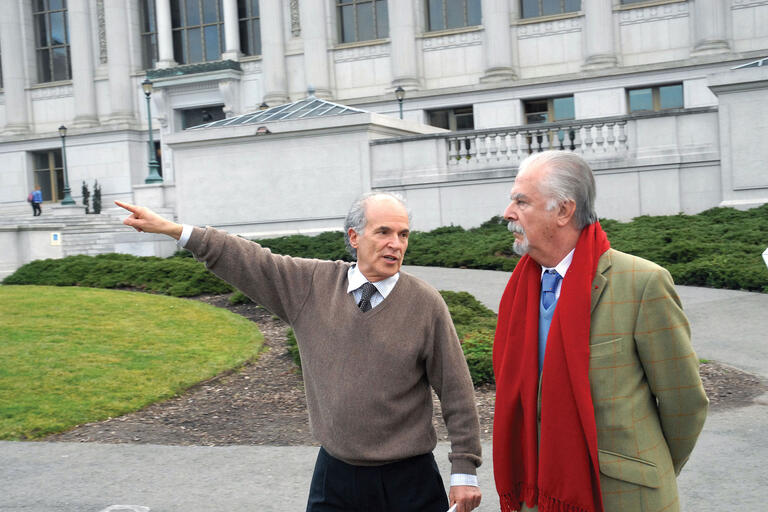 Harley Shaiken and Fernando Botero walk across the Berkeley campus, January 2007. (Photo by Jan Sturmann.)