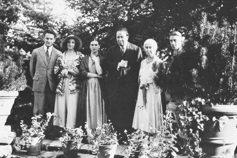 From left: Clifford and Jean Wight, Frida Kahlo, Diego Rivera, Edsel Ford’s mother Clara and an unknown person in Detroit. (Photo courtesy of Graham Beal.) Frida Kahlo and Diego Rivera with Edsel Ford’s mother Clara, among others, at a Ford estate in Detroit. (Photo courtesy of Graham Beal.)