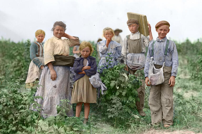 Earlier faces of immigration: a family of Polish migrant berry pickers in Maryland in 1909. (Photo by Lewis Hine from Wikimedia Commons, colored by Robek.) Earlier faces of immigration: a portrait of a family of Polish migrant berry pickers in Maryland in 1909. (Photo by Lewis Hine from Wikimedia Commons, colored by Robek.)