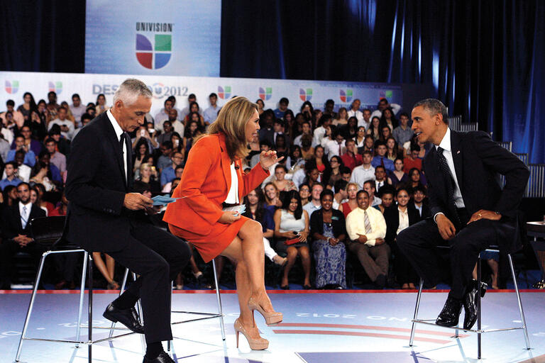 President Barack Obama with Univision’s national anchors, Jorge Ramos and María Elena Salinas, during the 2012 campaign. (Photo by Jeffrey M. Boan/Univision.) President Barack Obama on stage being interviewed by Univision’s national anchors, Jorge Ramos and María Elena Salinas, during the 2012 campaign. (Photo by Jeffrey M. Boan/Univision.)