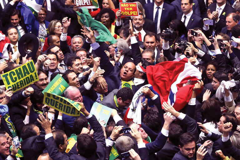 The Brazilian Chamber of Deputies during the impeachment vote, April 2016. (Photo by Marcelo Camargo/Agência Brasil Fotografias.) The Brazilian Chamber of Deputies is a scrum of struggling lawmakers during the impeachment vote, April 2016. (Photo by Marcelo Camargo/Agência Brasil Fotografias.)