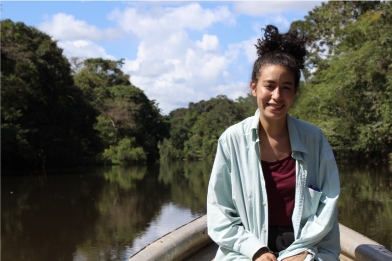 Valeria Ramírez Castañeda in Lake Tarapoto, 2 hours from Leticia in boat looking for a poison frog, (Photo by Alfonso Fierro.)