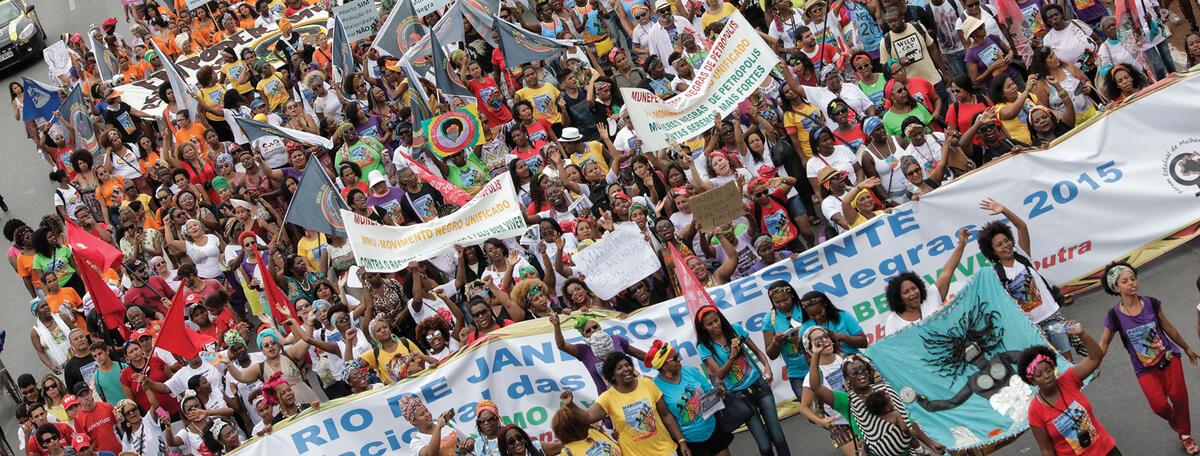 A 2015 women’s march in Brazil calls for greater respect for Black Brazilian citizens and culture. (Photo by Janine Moraes, Courtesy of Secretaria Especial da Cultura do Ministério da Cidadania, Brazil.) A 2015 women’s march crowds the streets in Brazil, with calls for greater respect for Black Brazilian citizens and culture. (Photo by Janine Moraes, Courtesy of Secretaria Especial da Cultura do Ministério da Cidadania, Brazil.)