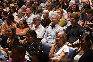 Audience members laugh at stories from Isabel Allende, February 2020. (Photo by Peg Skorpinski.)