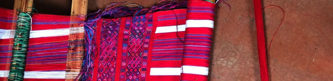 Mam Mayan fabrics in reds, blues, and whites. (Photo courtesy of Henry Salas.)