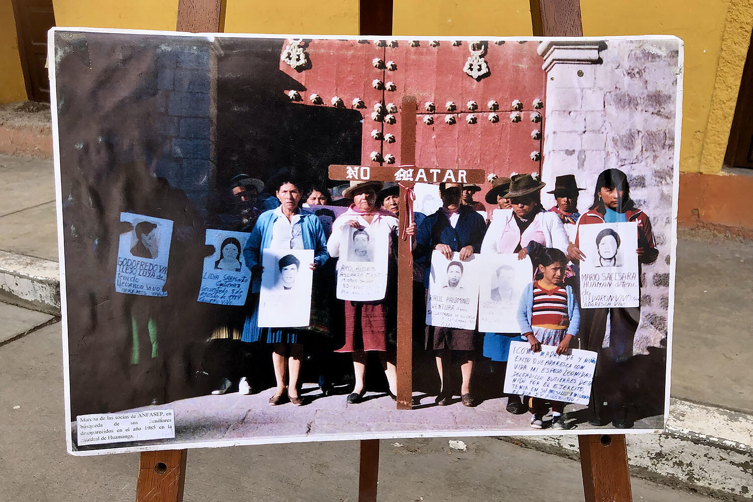 A photo of a 1985 protest displayed outside the Museo de la Memoria in Ayacucho. (Photo by Emily Fjaellen Thompson.)
