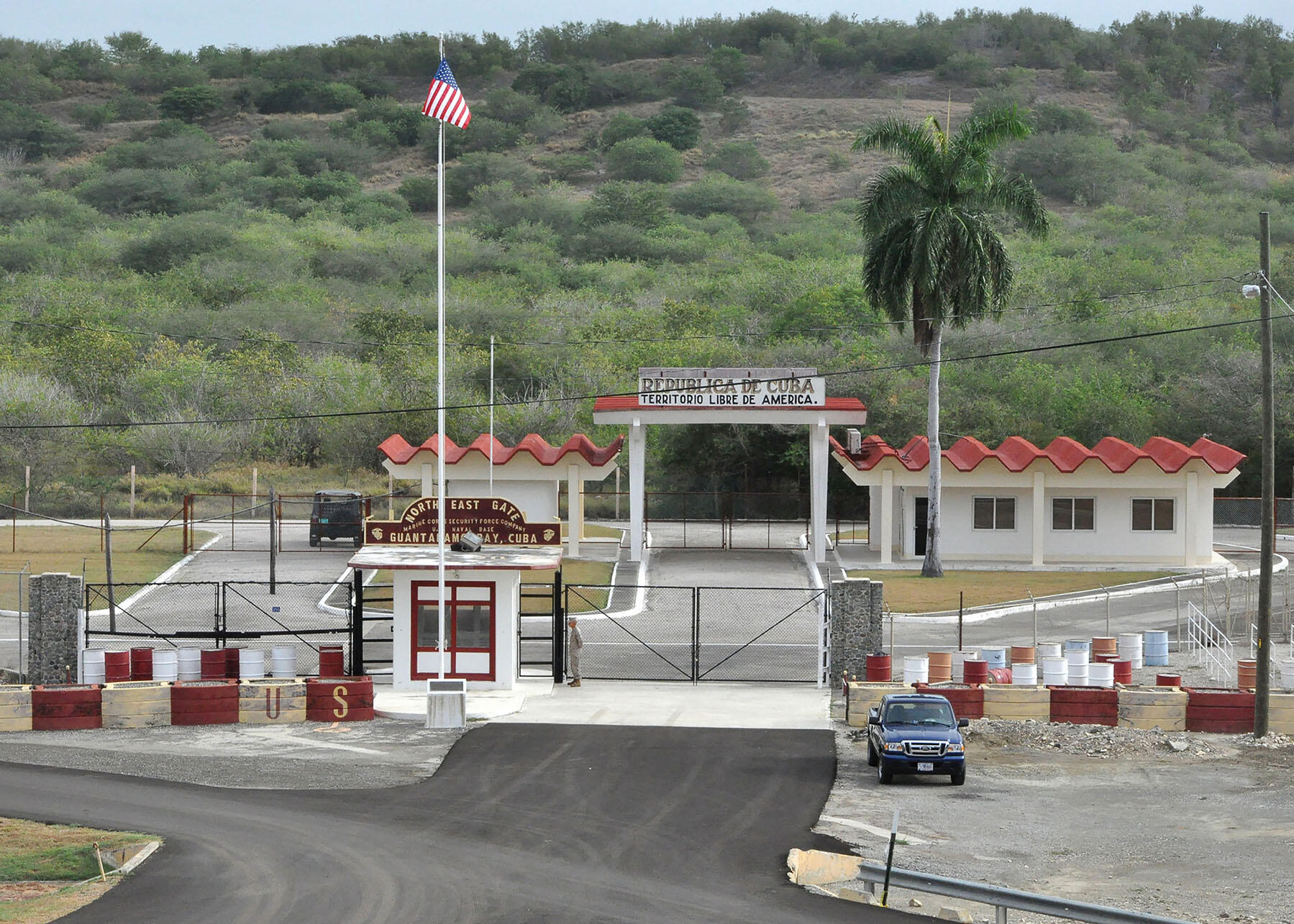 The northeast gate of the U.S. naval base at Guantanamo Bay, Cuba. (Photo by Bill Mesta/U.S. Navy.)