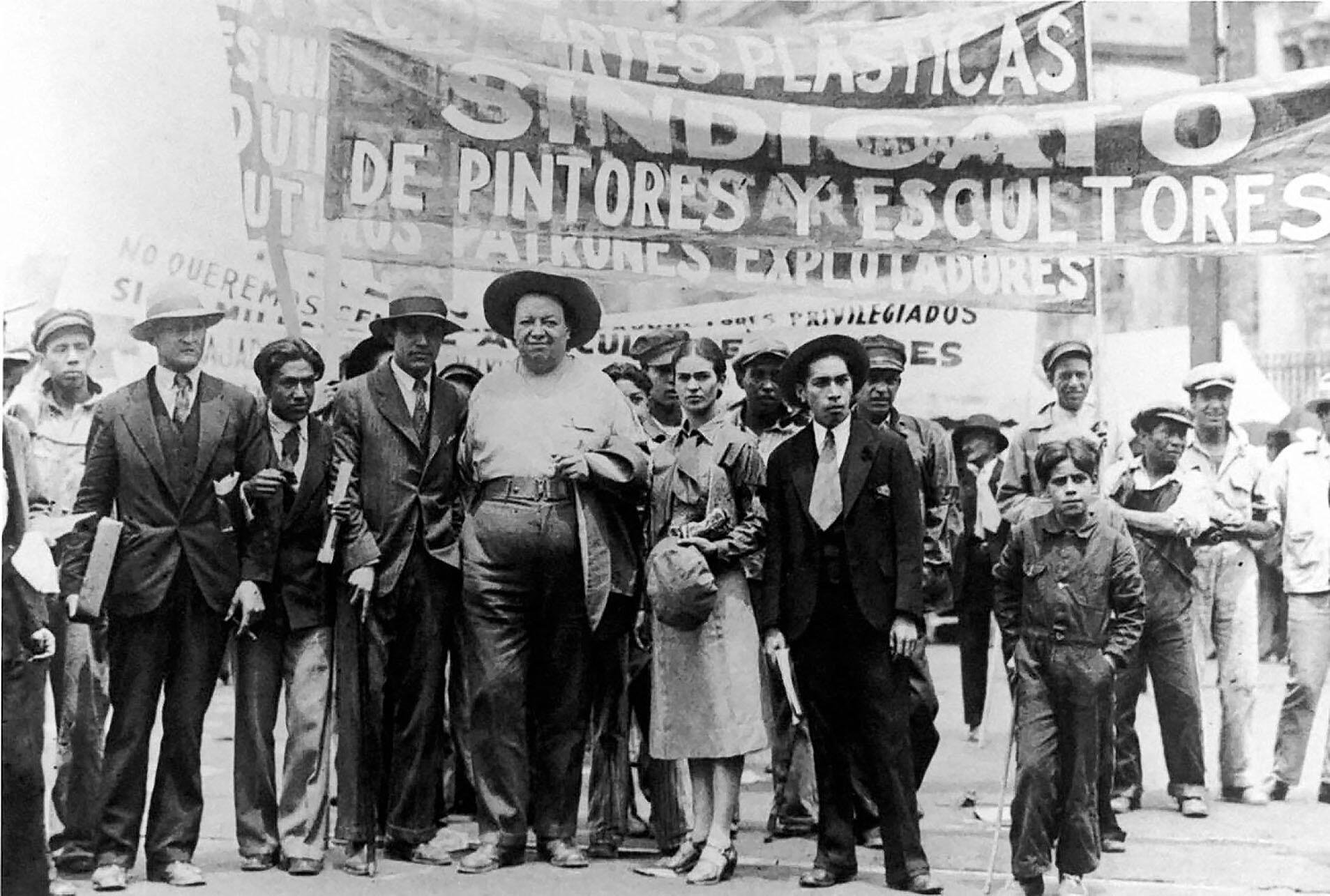 Diego Rivera and Frida Kahlo with members of the Artists’ Union at a May Day march in Mexico City, 1929. (Photo by Tina Modotti.)