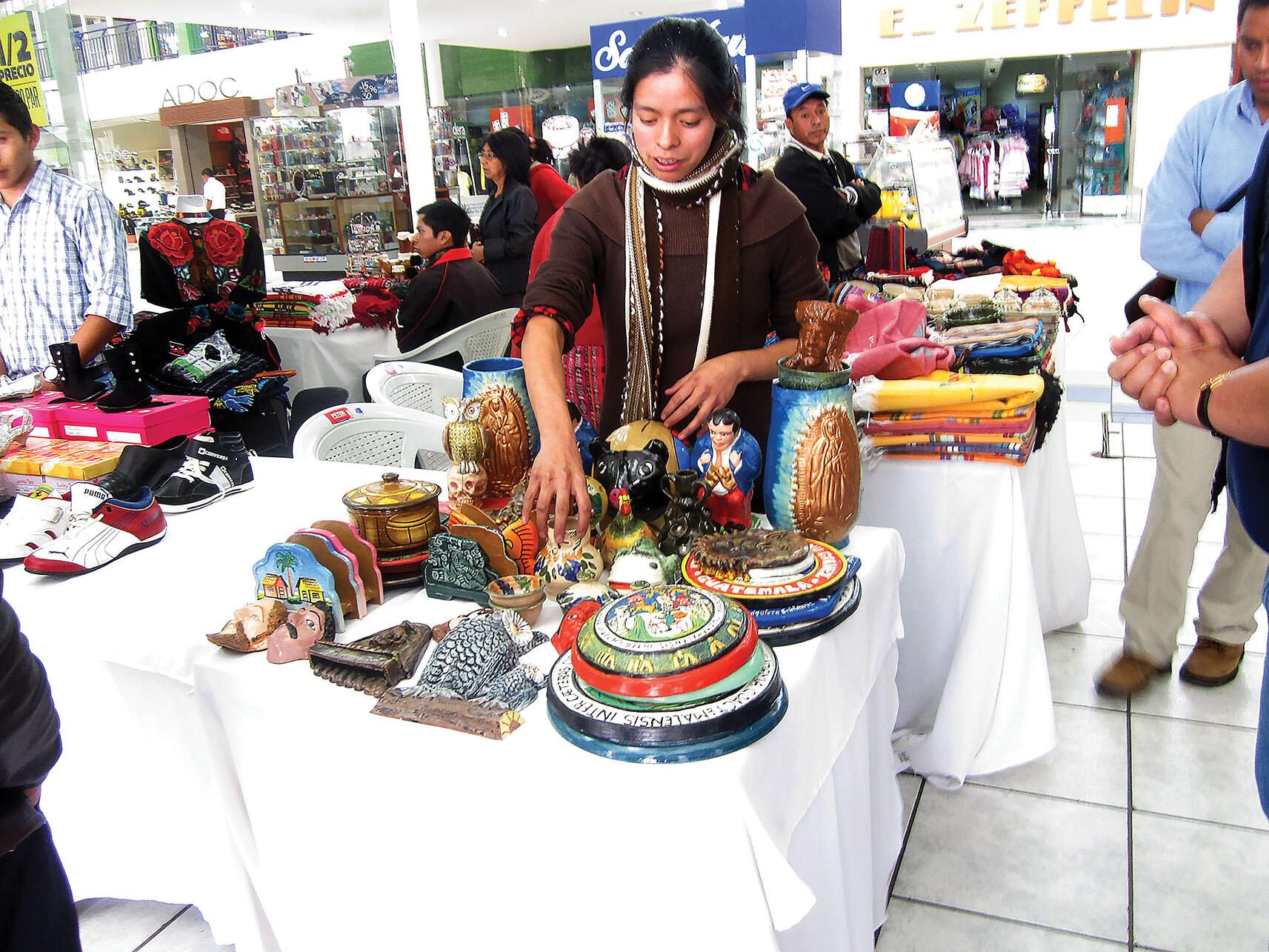 A Grupos Gestures member selling her craftwares at a local fair in Quetzaltenango, Guatemala. (Photo by Karen Chapple.)