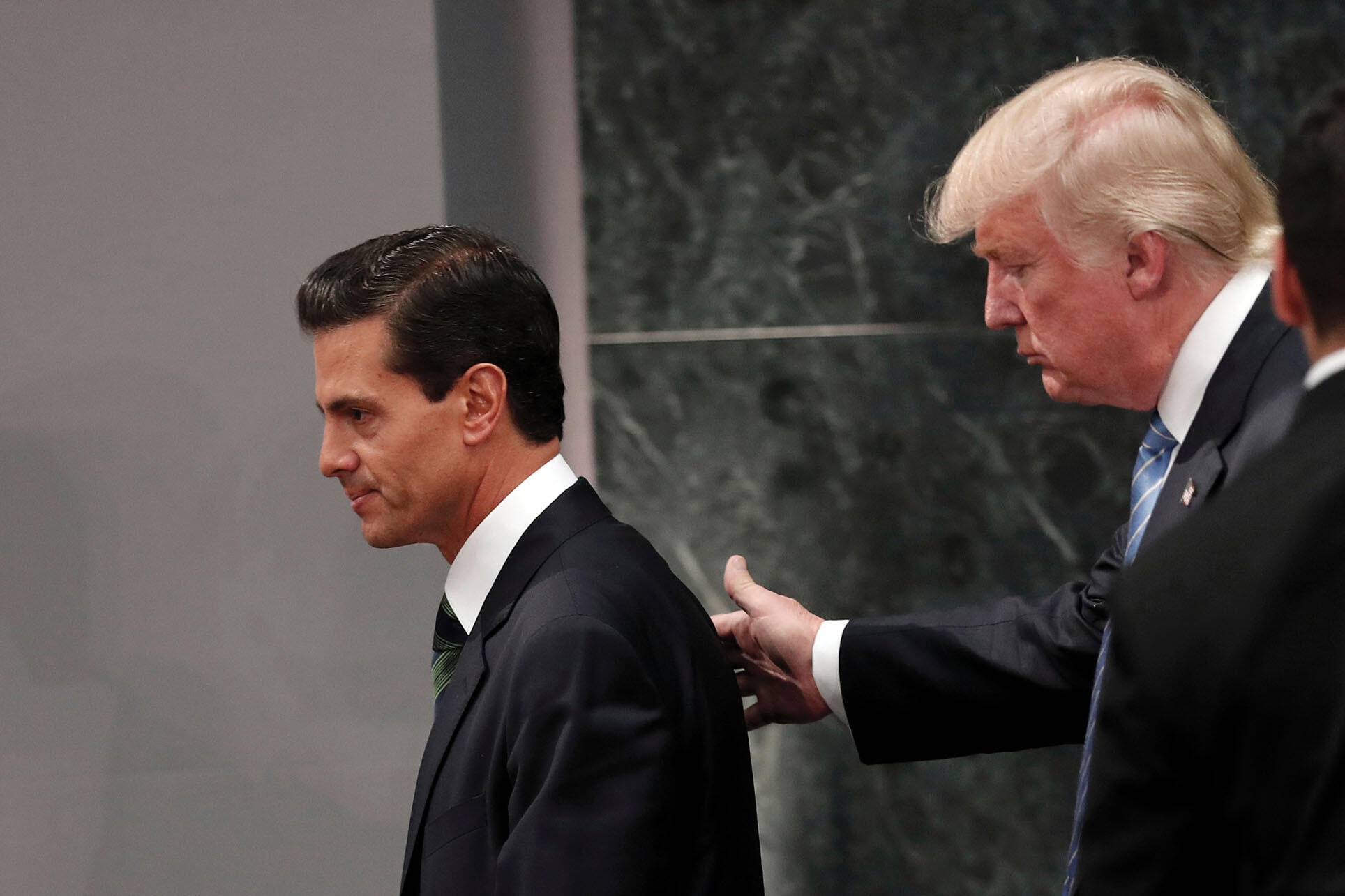 Enrique Peña Nieto hosts then-Republican presidential nominee Donald J. Trump in August 2016. (Photo by Dario Lopez-Mills/Associated Press.)