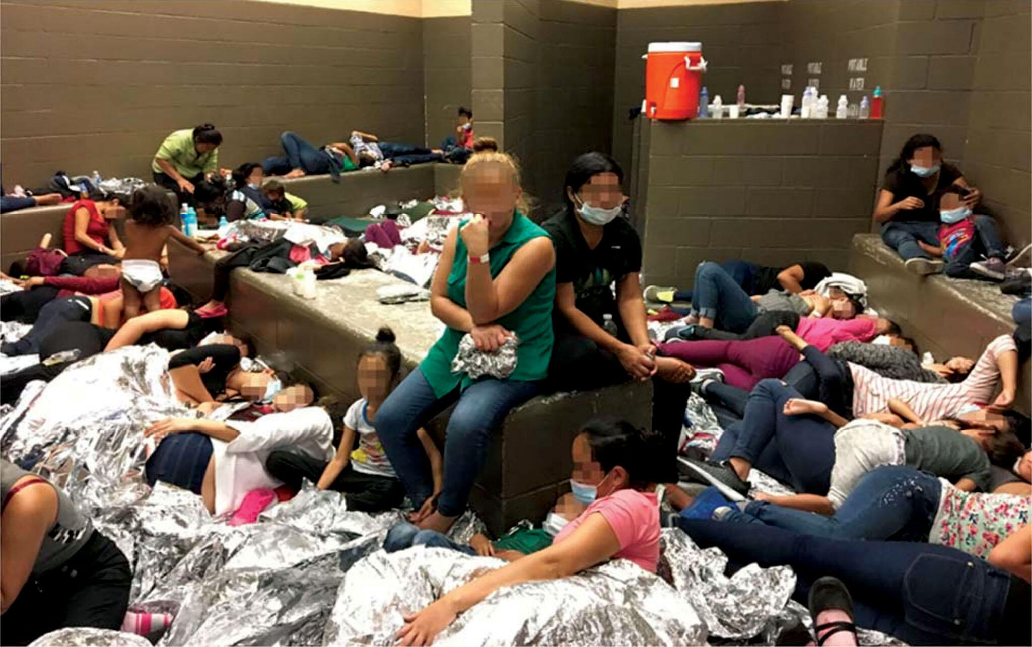 Families detained at the overcrowded Customs and Border Patrol station in Weslaco, Texas, June 2019. (Photo from Department of Homeland Security, Office of the Inspector General.)