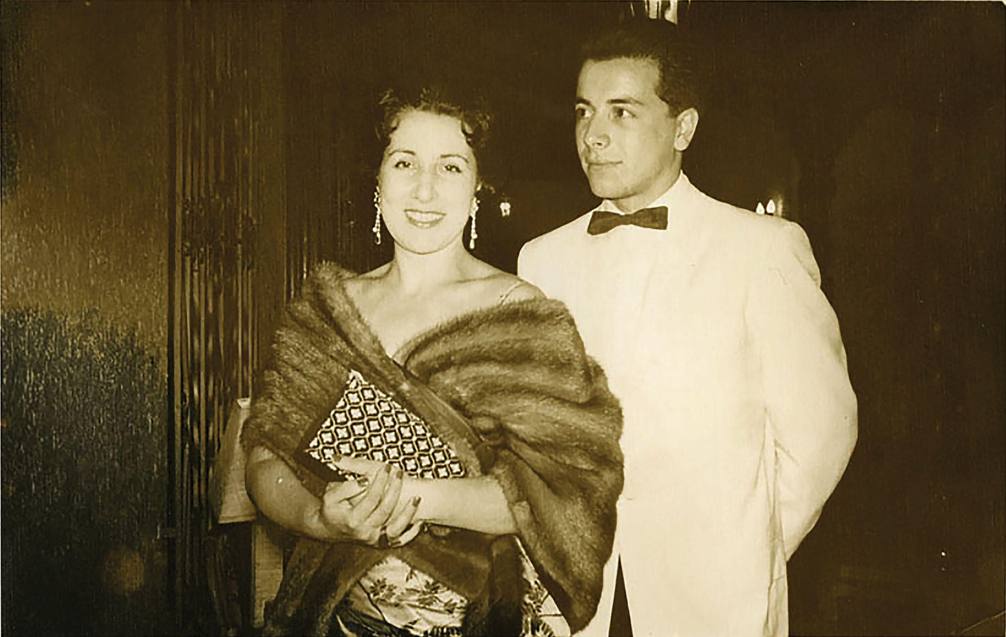 Juan Guzmán Tapia escorts his mother, Raquel Tapia Caballero, to a function in El Salvador, 1957. (Photo courtesy of Juan Guzmán Tapia.)